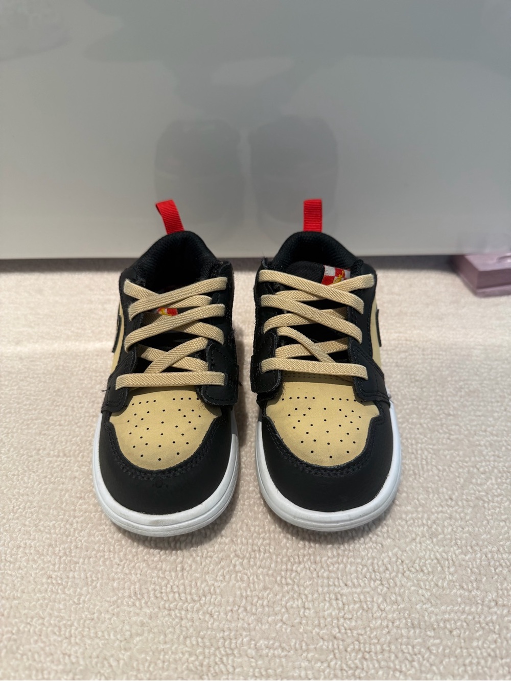 Kids Black and Beige Nike Dunk Low-Top Sneakers